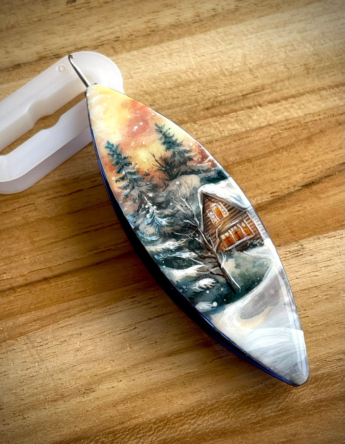 Dreamlit shuttle decorated, handcrafted design on one side, Golden Winter Evening