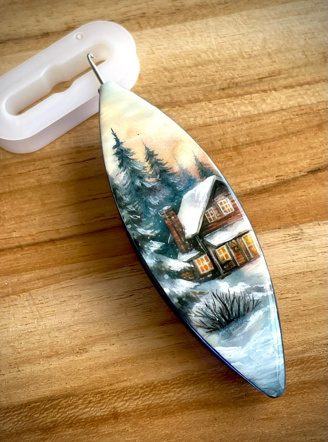 Dreamlit shuttle decorated, handcrafted design on one side, Twilight in the Pines