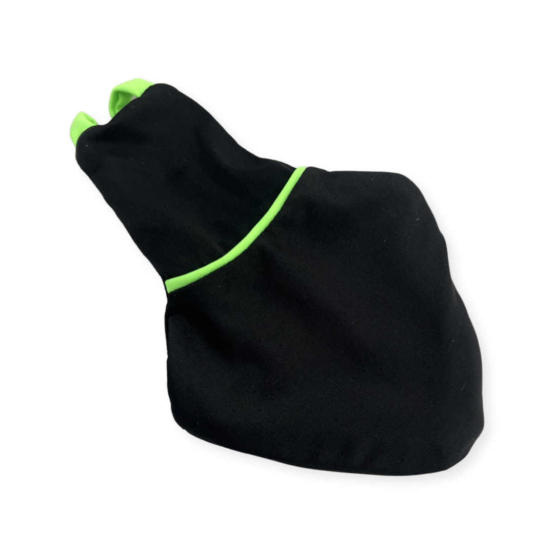 Flyper bird diaper, solid black, thin lime green horizontal stripe along the waist, lime green shoulder straps.