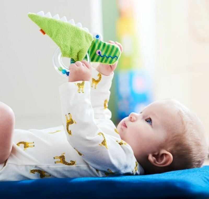 Clutching Toy Crocodile