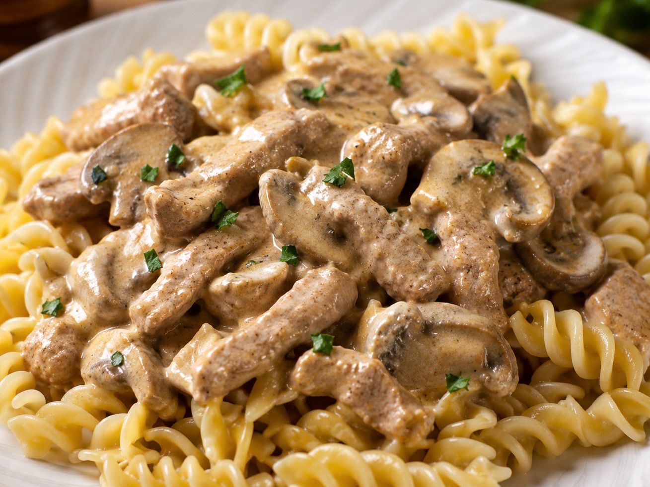 Homestyle Savory Pork Stroganoff Over Bed Of Egg Noodles