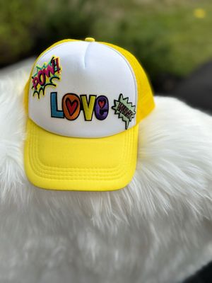 PATCHWORKZ: Soft Form Trucker Hat With Multiple Patches.