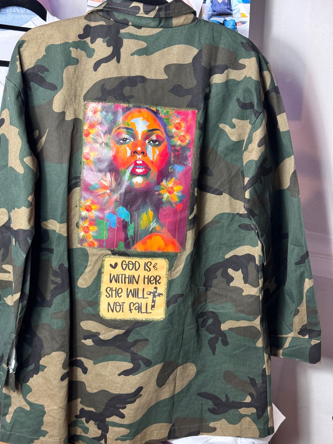 PATCHWORKZ: Quarter length camo jacket  with motivational saying and colorful patches