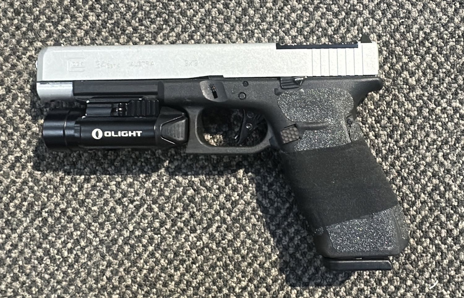 Consignment Glock 34 G4 MOS 9mm - Cerakoted Silver Slide- Upgraded lighter Trigger- Olight Torch x2 Mags - SN: BEFW556