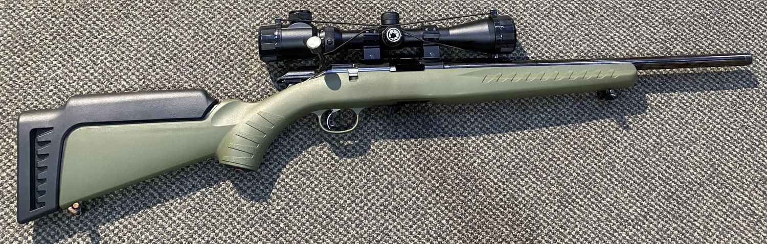 CONSIGNMENT USED RUGER AEMRICAN .22LR 10RND CASED W/ SCOPE GREEN STOCK SN: 834-58464