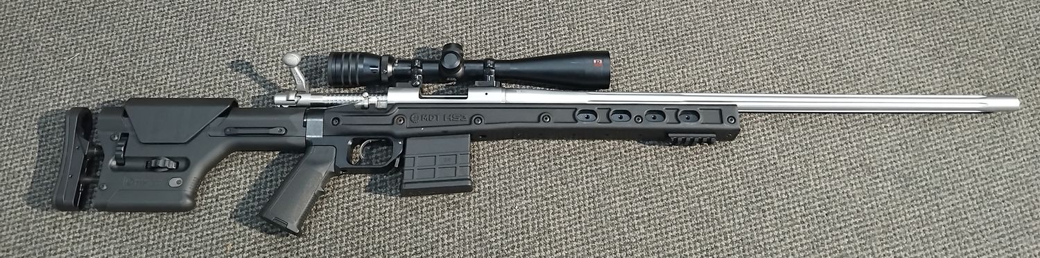 Used Remington 700 .308WIN varmint fluted with redfeild 4-12 rifle scope MDT HS3 chasis SN: S6720515