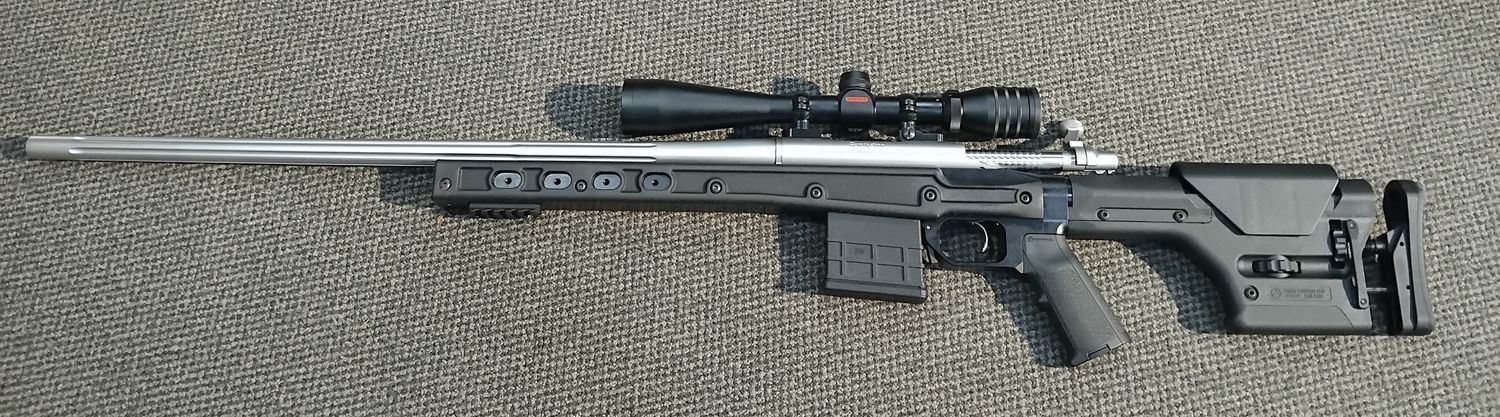 Used Remington 700 .308WIN varmint fluted with redfeild 4-12 rifle scope MDT HS3 chasis SN: S6720515