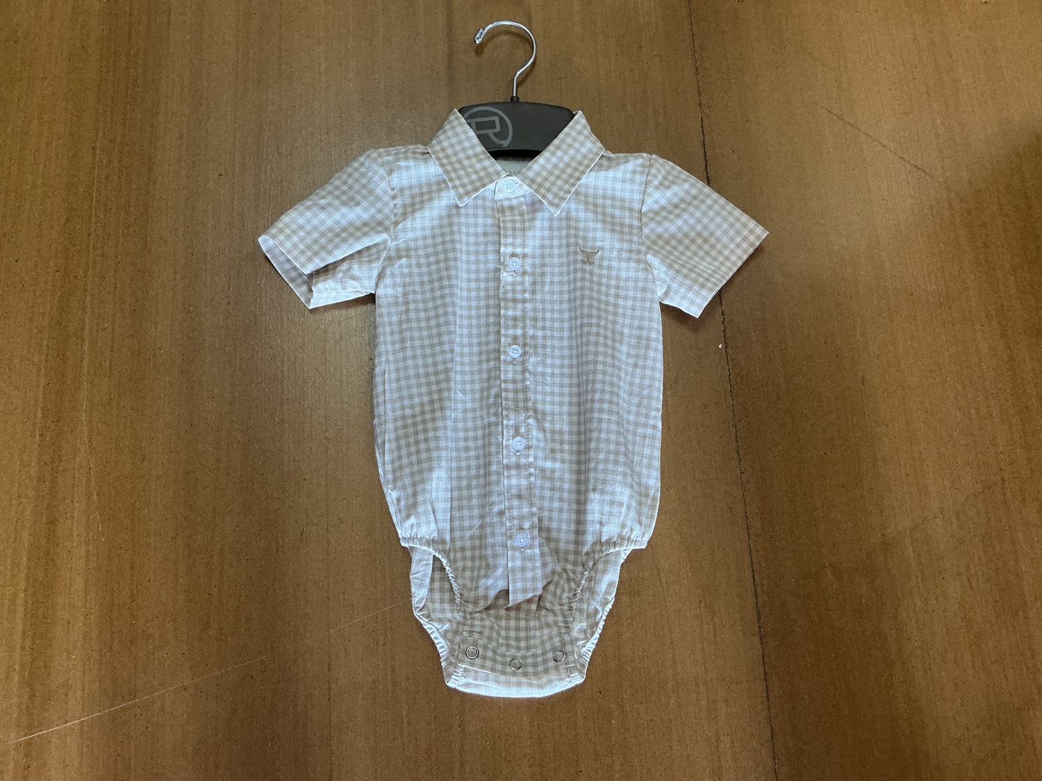 INFANTS FRANKIE FAWN SHORT SLEEVED FULL BUTTON JUMPSUIT.