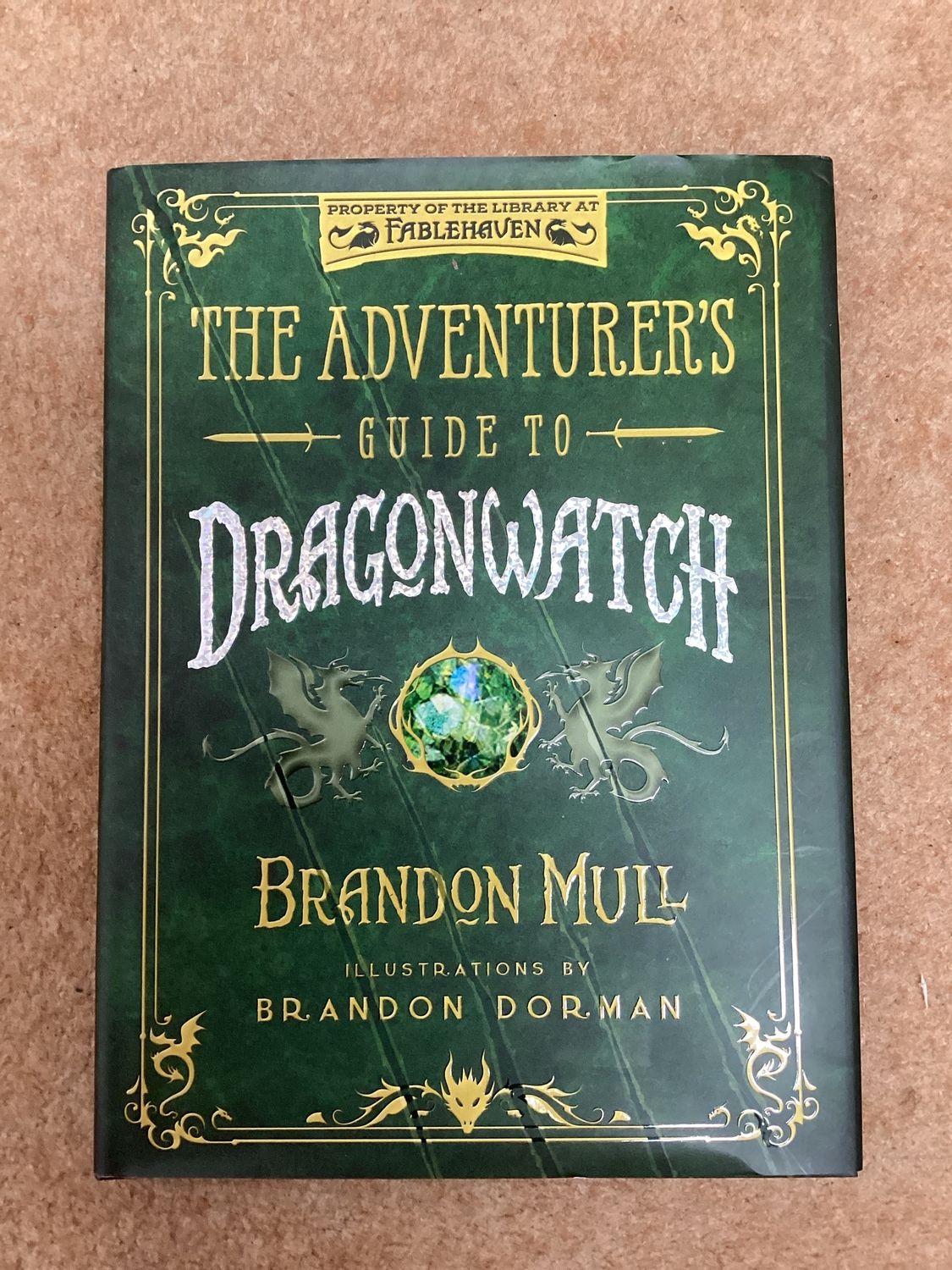 *** PRELOVED/SECOND HAND*** The Adventure&#39;s Guide to  Dragonwatch. Brandon Mull