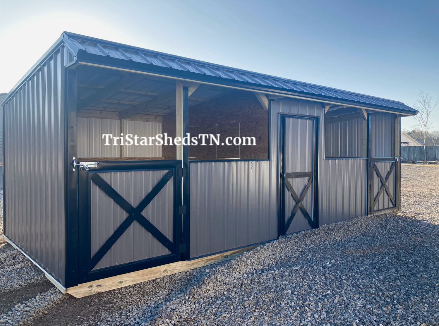 10x24 DELUXE TWO STALL BARN. CENTER FEED ROOM