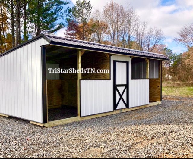 10x24 TWO STALL BARN. HALF WALLS. CENTER FEED ROOM