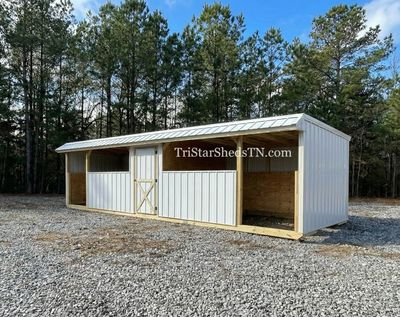 10x27 TWO STALL BARN. Center Feed Room