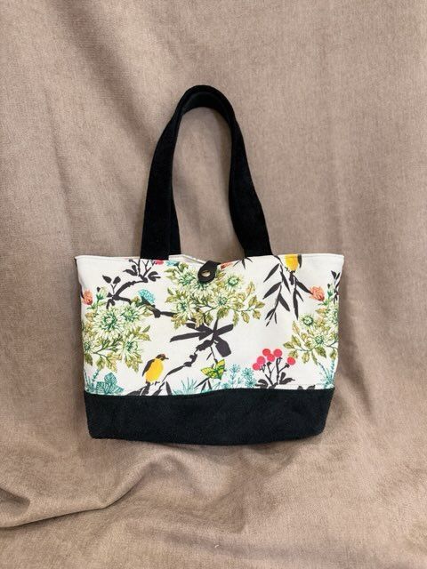 SAC BI-MATIERE VELOURS IMPRIME ET CUIR RETOURNE