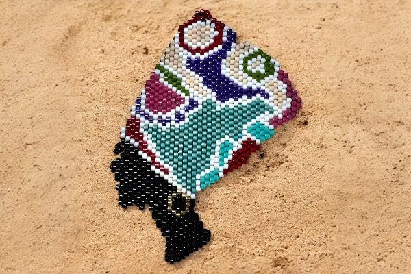 Broche 'Regard africain'