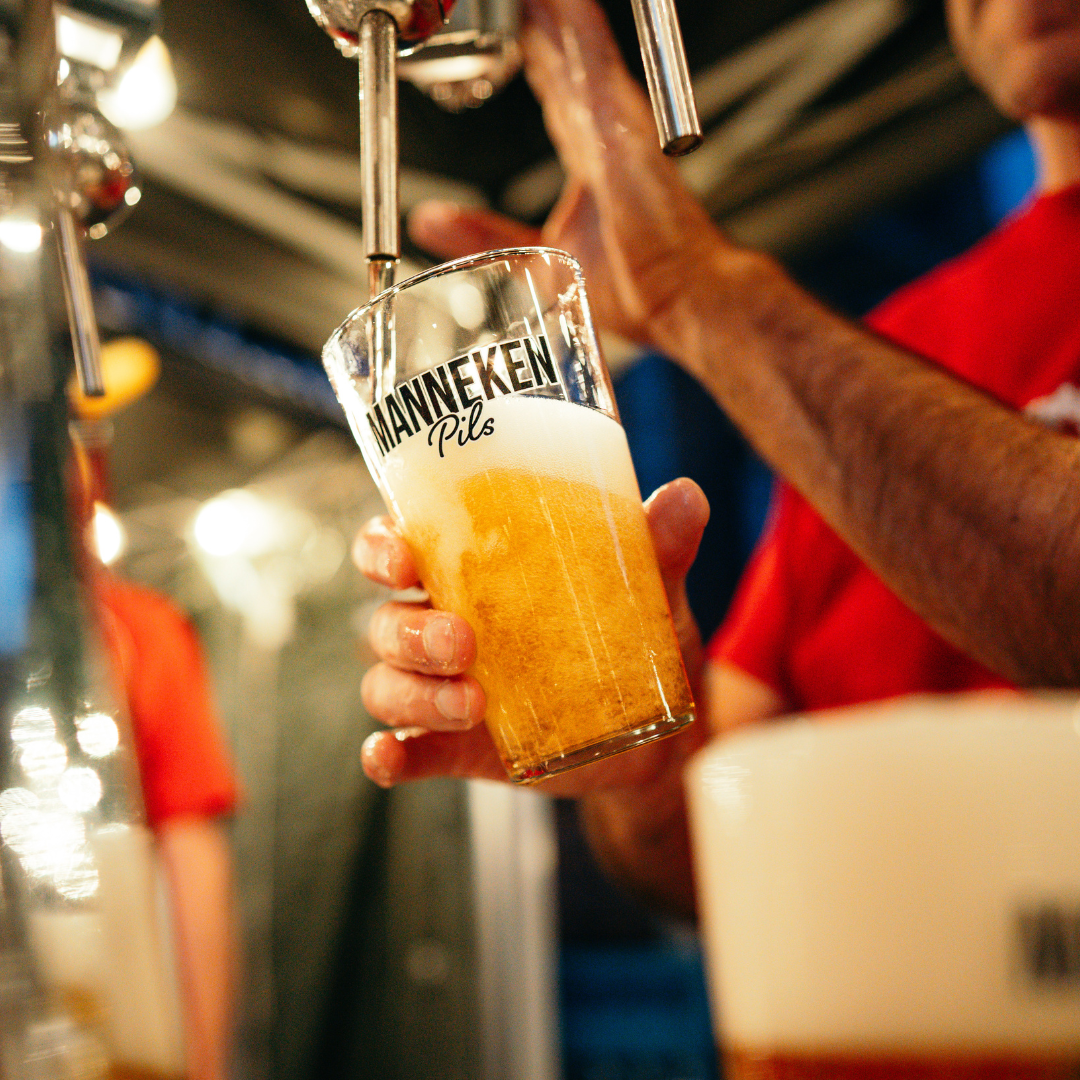 Manneken Pils glass