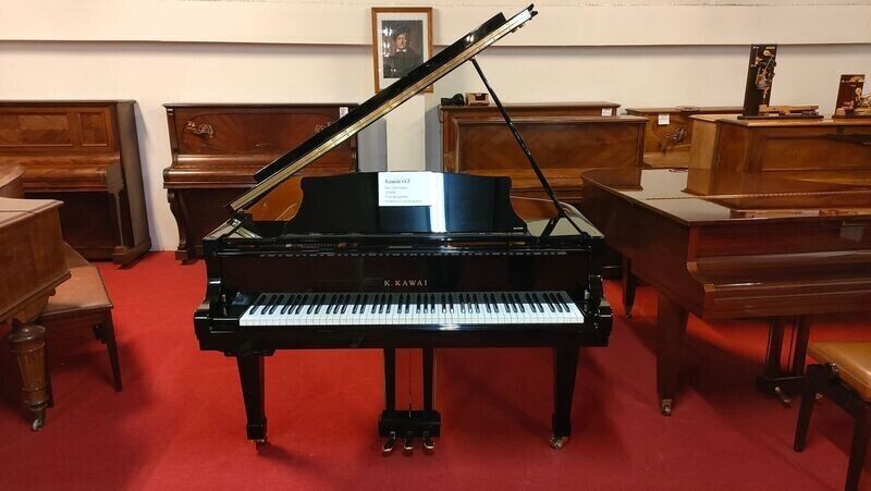Piano à queue Kawai d'occasion avec système silencieux et casque