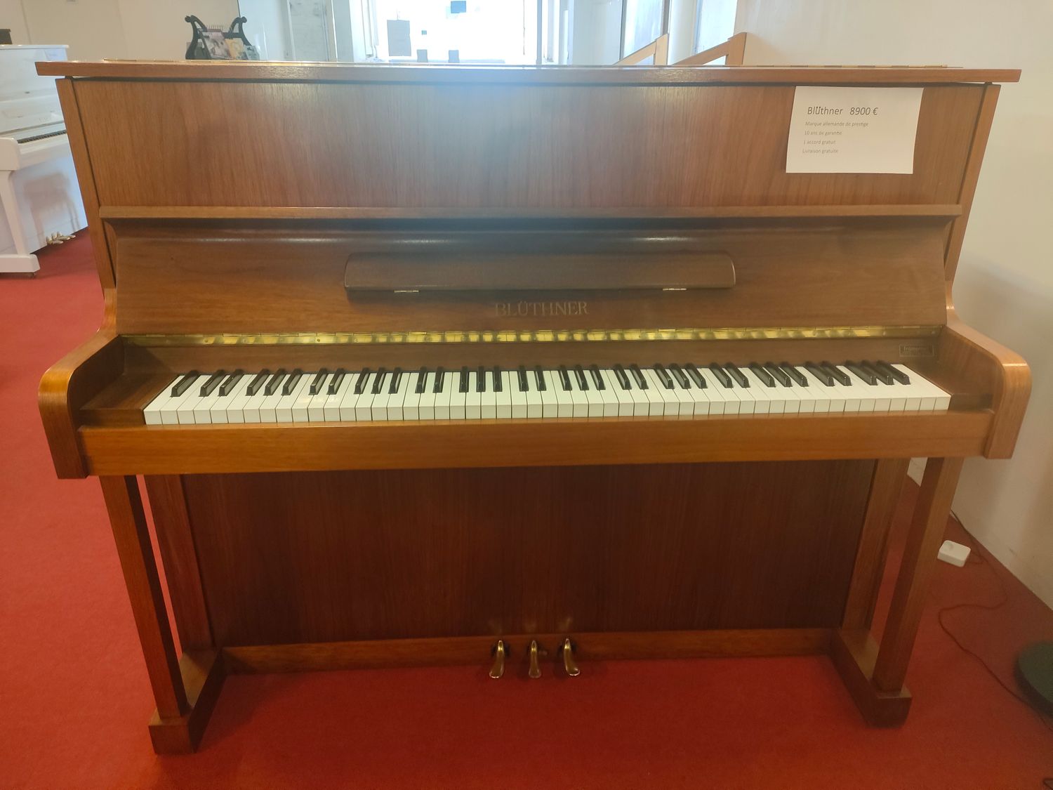 Piano droit Blüthner d'occasion