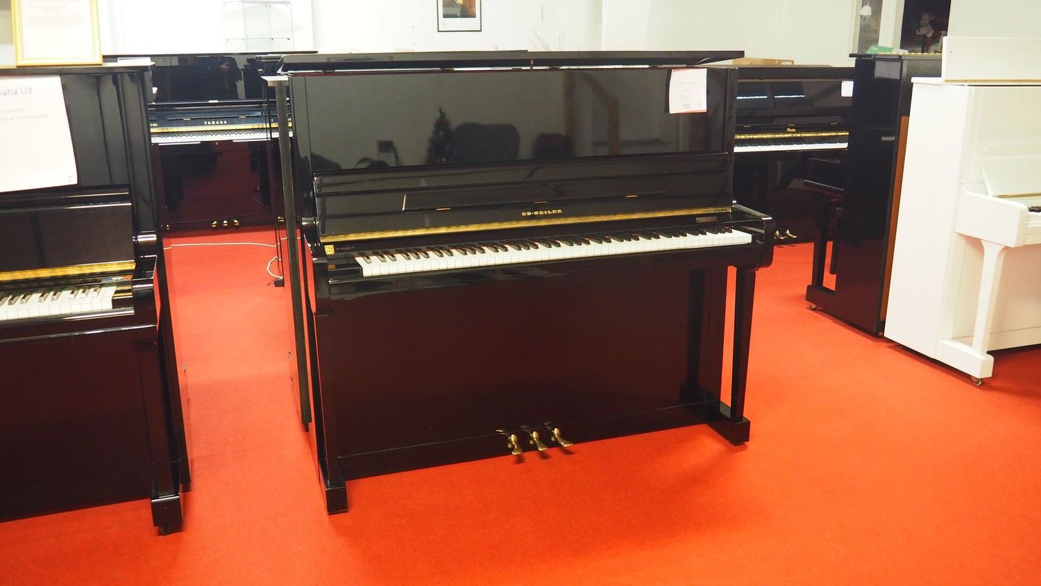 Piano droit Seiler 128 d'occasion Piano droit Seiler 128 d'occasion