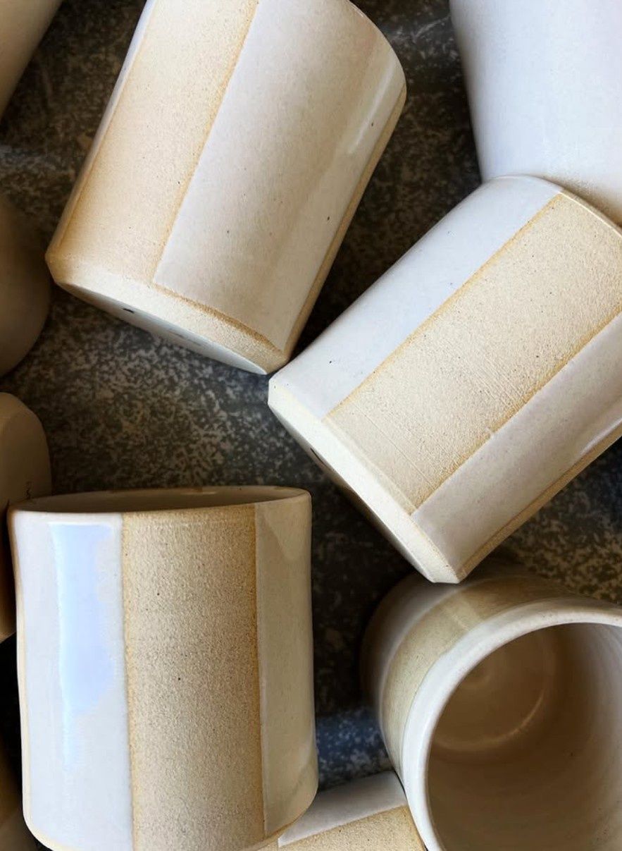 Twelve Gray Clay Tumblers
