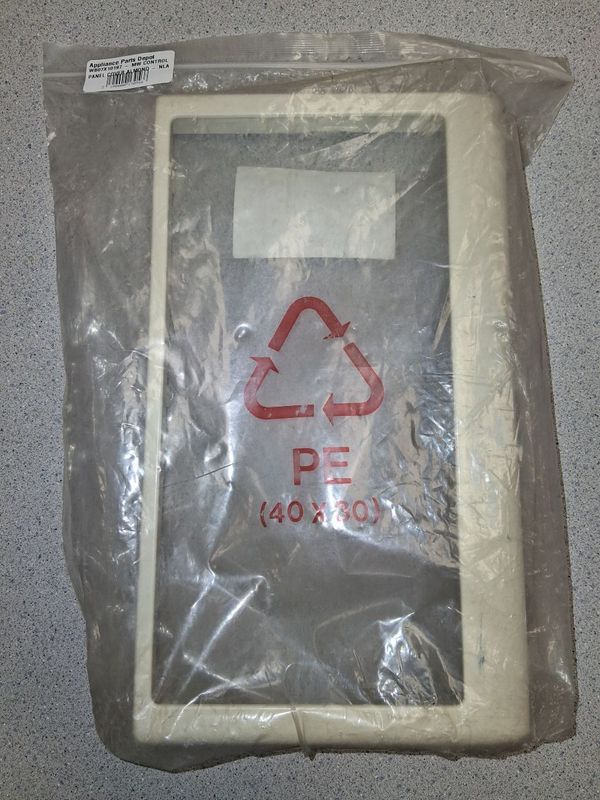 WB07X10197 - MICROWAVE CONTROL PANEL COVER ALMOND - NLA