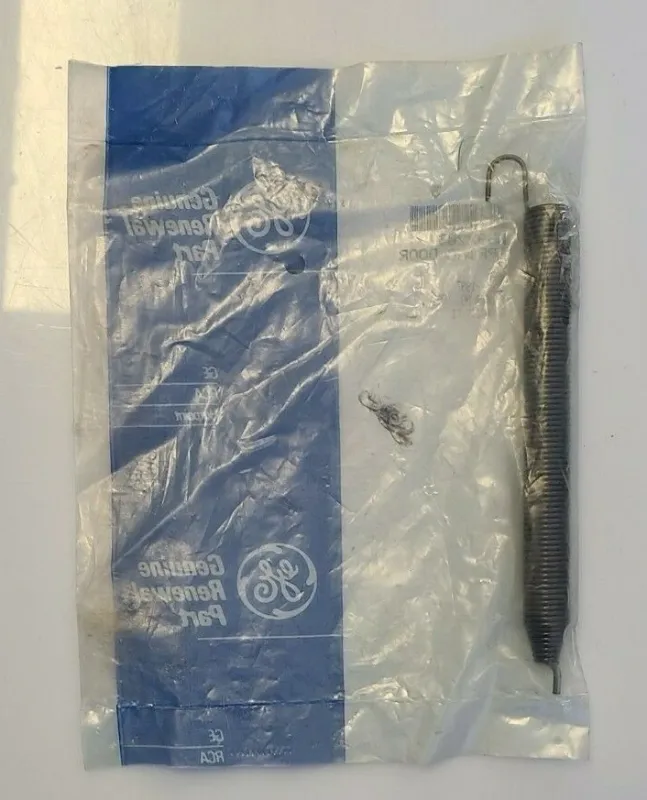 WB9X203 - OEM GE RANGE OVEN DOOR SPRING IN ORIGINAL PACKAGING - NLA