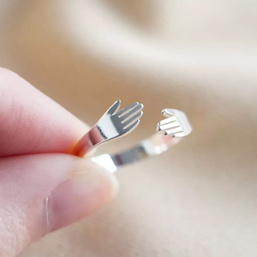 Adjustable Silver Hug Hands Ring Lisa Angel