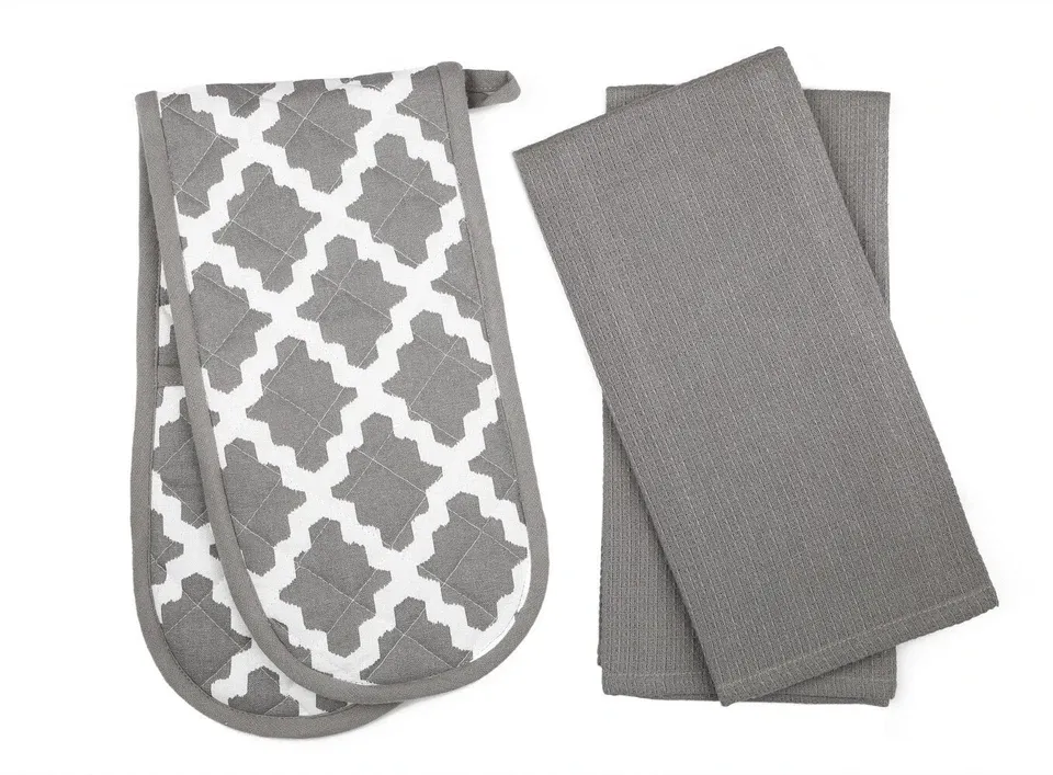 Penguin home Grey Patterned Oven Gloves / Striped tea Towel 2 Piece set Penguin home Grey Patterned Oven Gloves / Striped tea Towel 2 Piece set