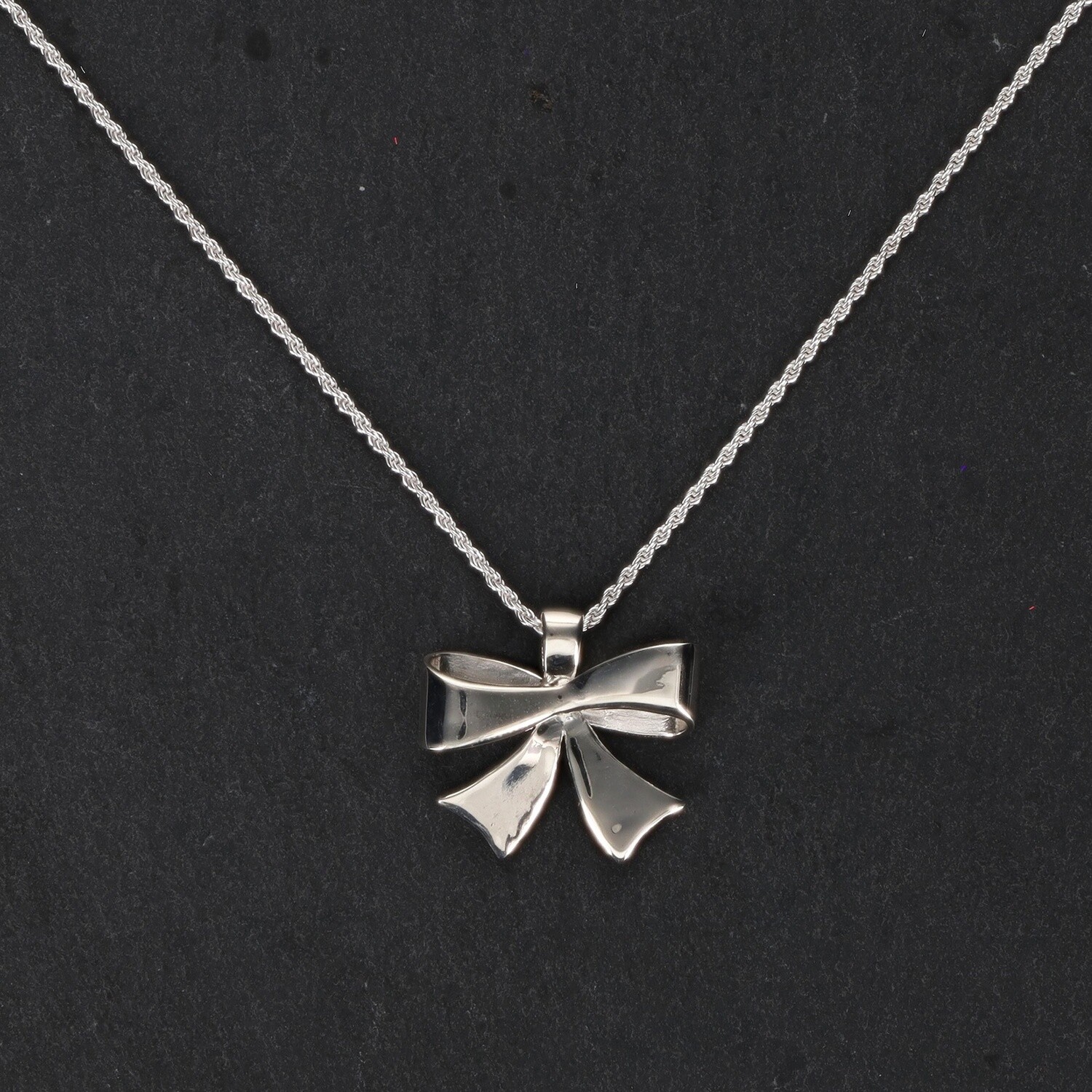 Silver Bow Pendant Necklace