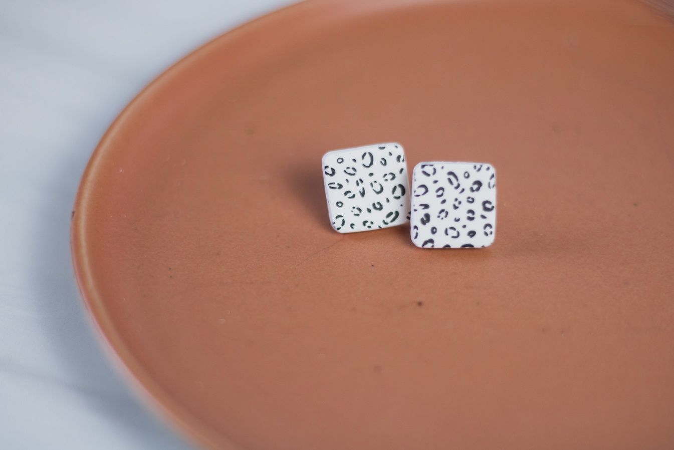 White Cheetah Studs