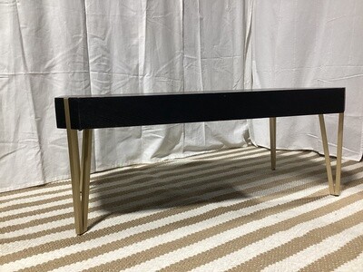 Modern black wood and gold accented table