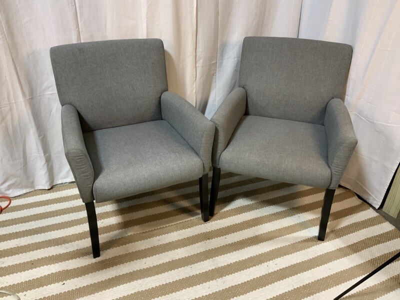 Gray linen chairs with dark wood legs