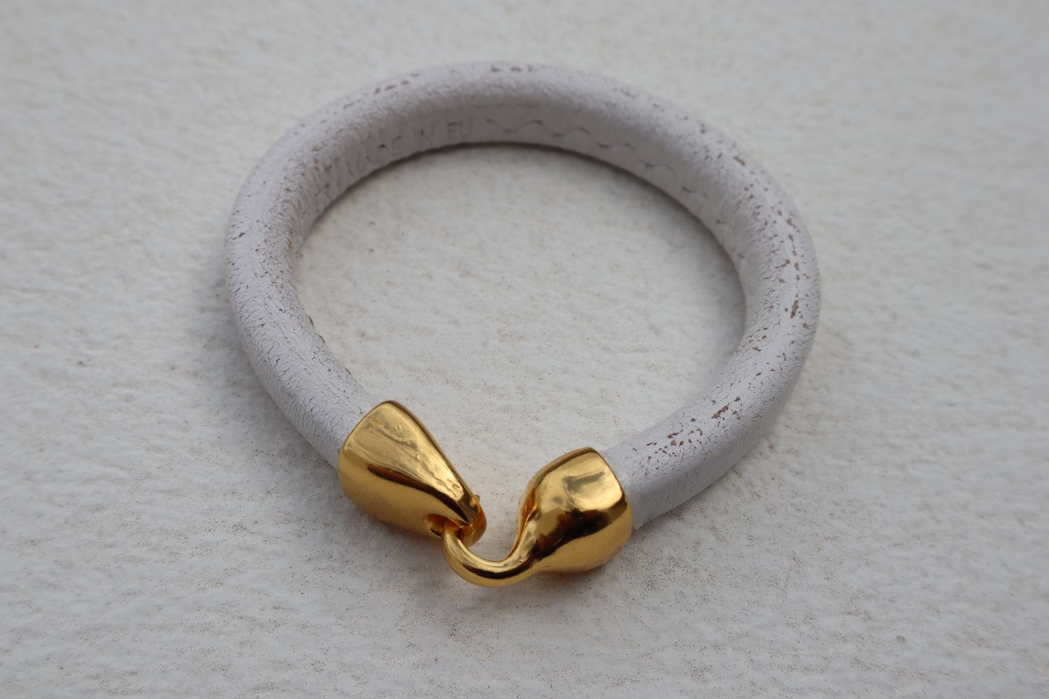 OLYMPOS handmade white Regaliz leather men's bracelet with brass-coloured closure