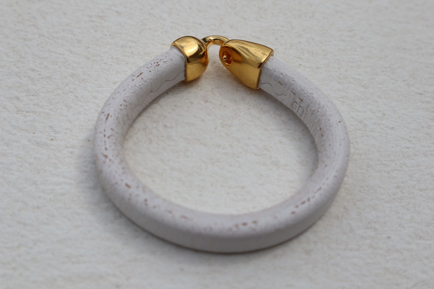 OLYMPOS handmade white Regaliz leather men's bracelet with brass-coloured closure