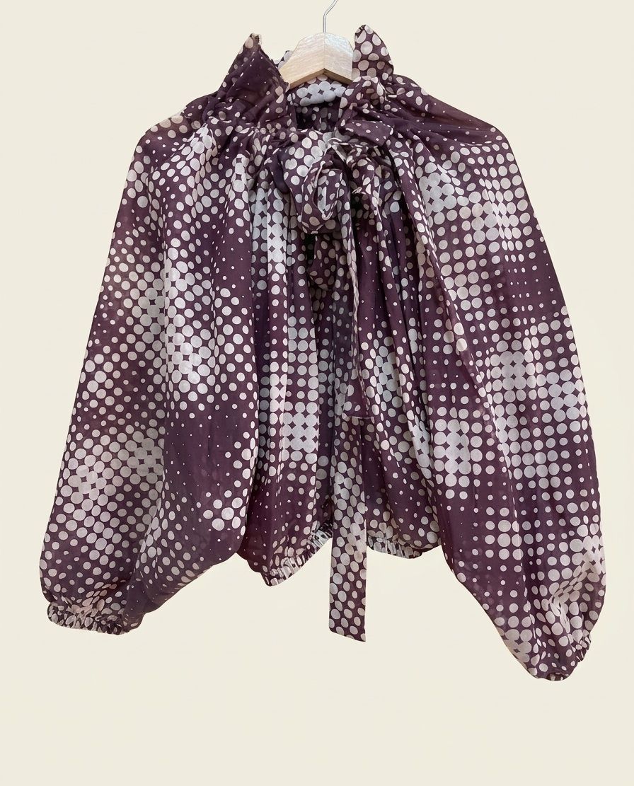 Blusa NOE vaporosa de topos con lazada