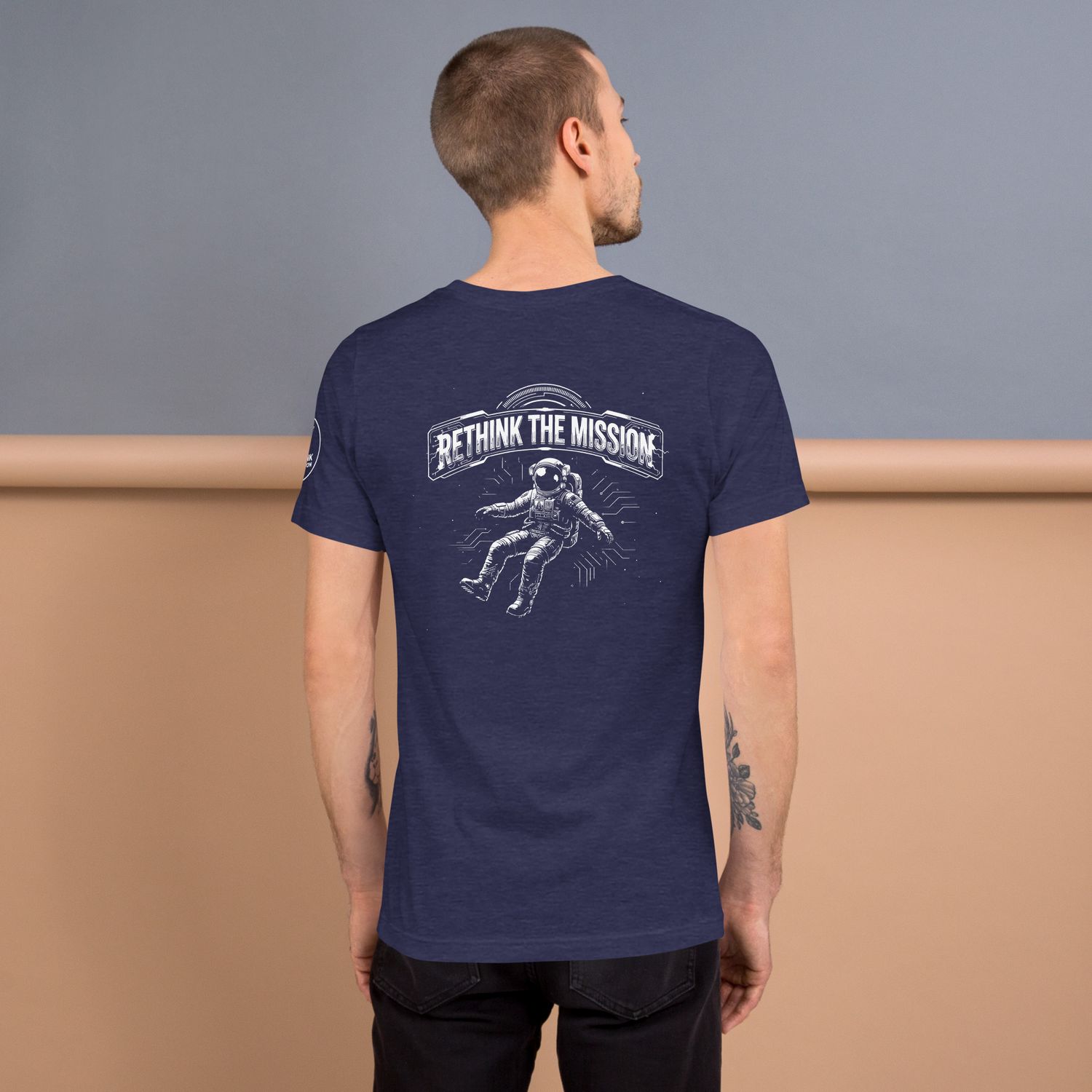 RETHINK THE MISSION ASTRONAUT TEES 