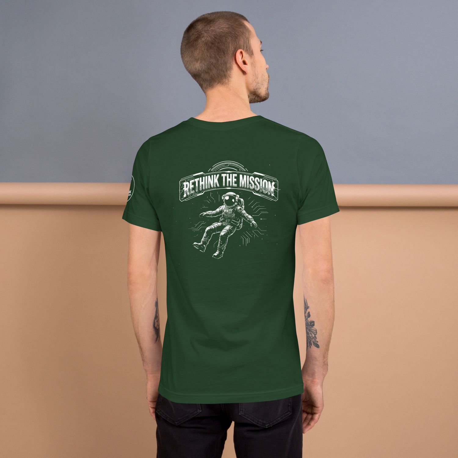 RETHINK THE MISSION ASTRONAUT TEES 