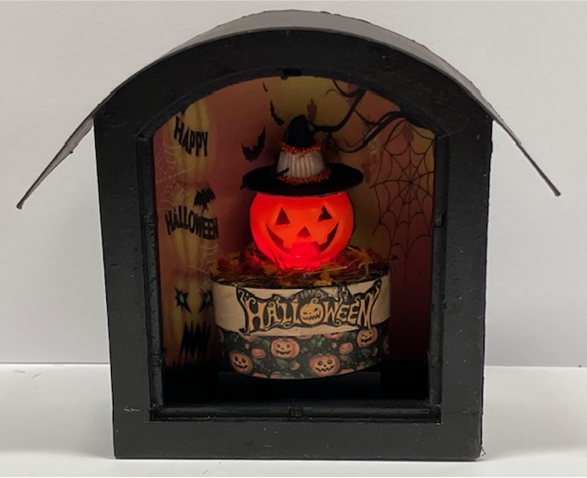 Flickering Jack-O-Lantern in a Window