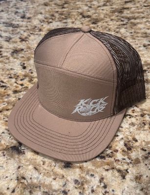 Tan kick rocks hat small white logo