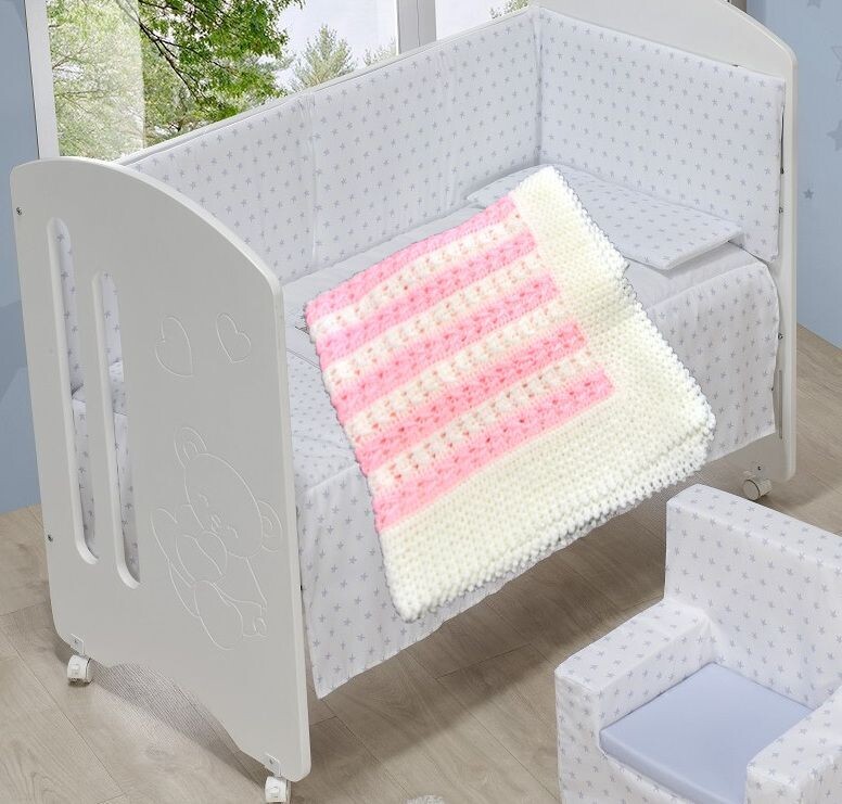 Mantita rectangular rosa y blanca artesanía