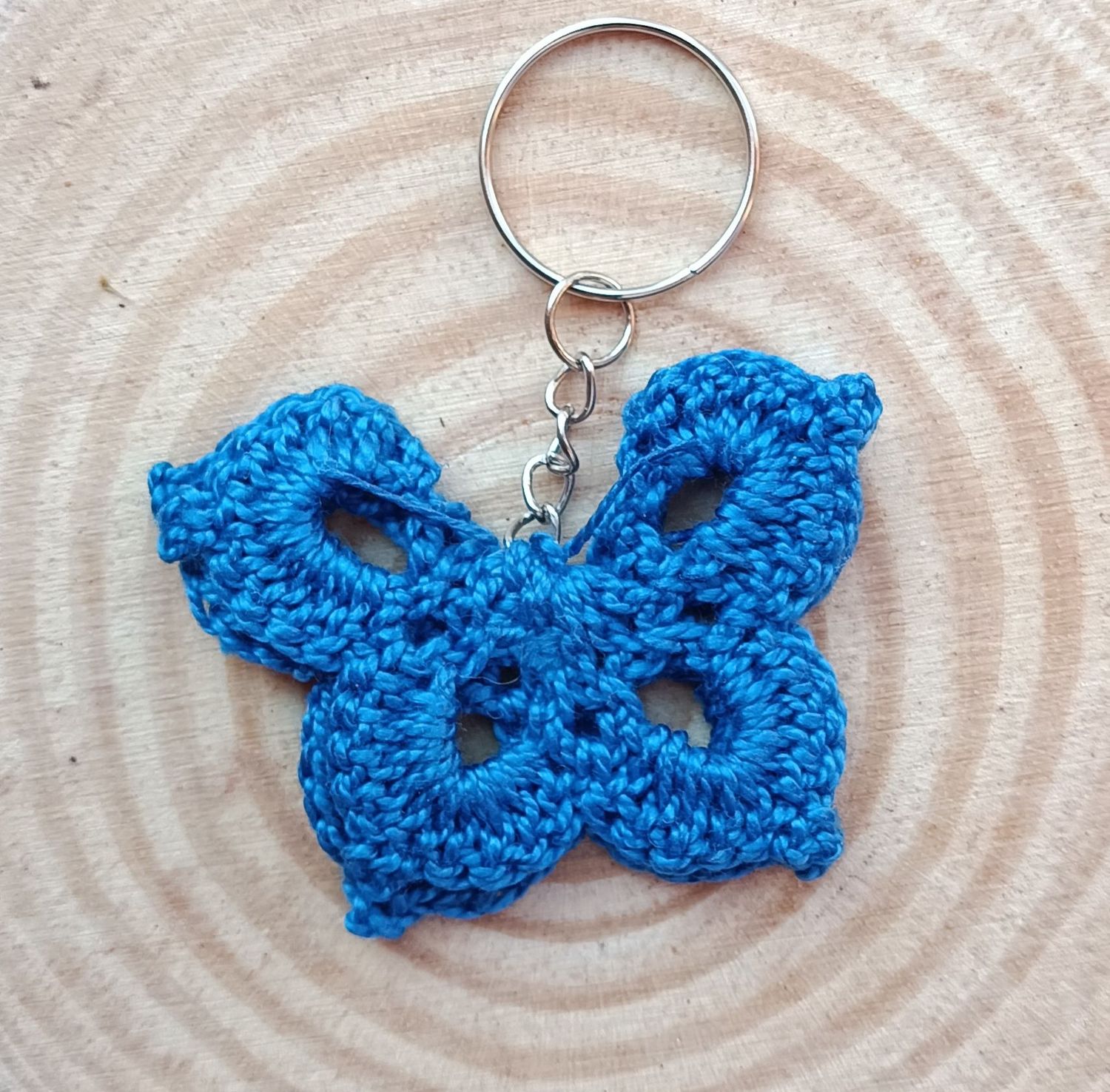 Llavero mariposa azul marino artesanía