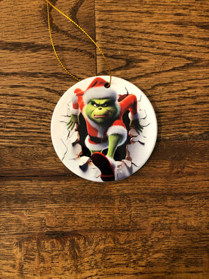 Ceramic Ornament - Grinch busting through the wall