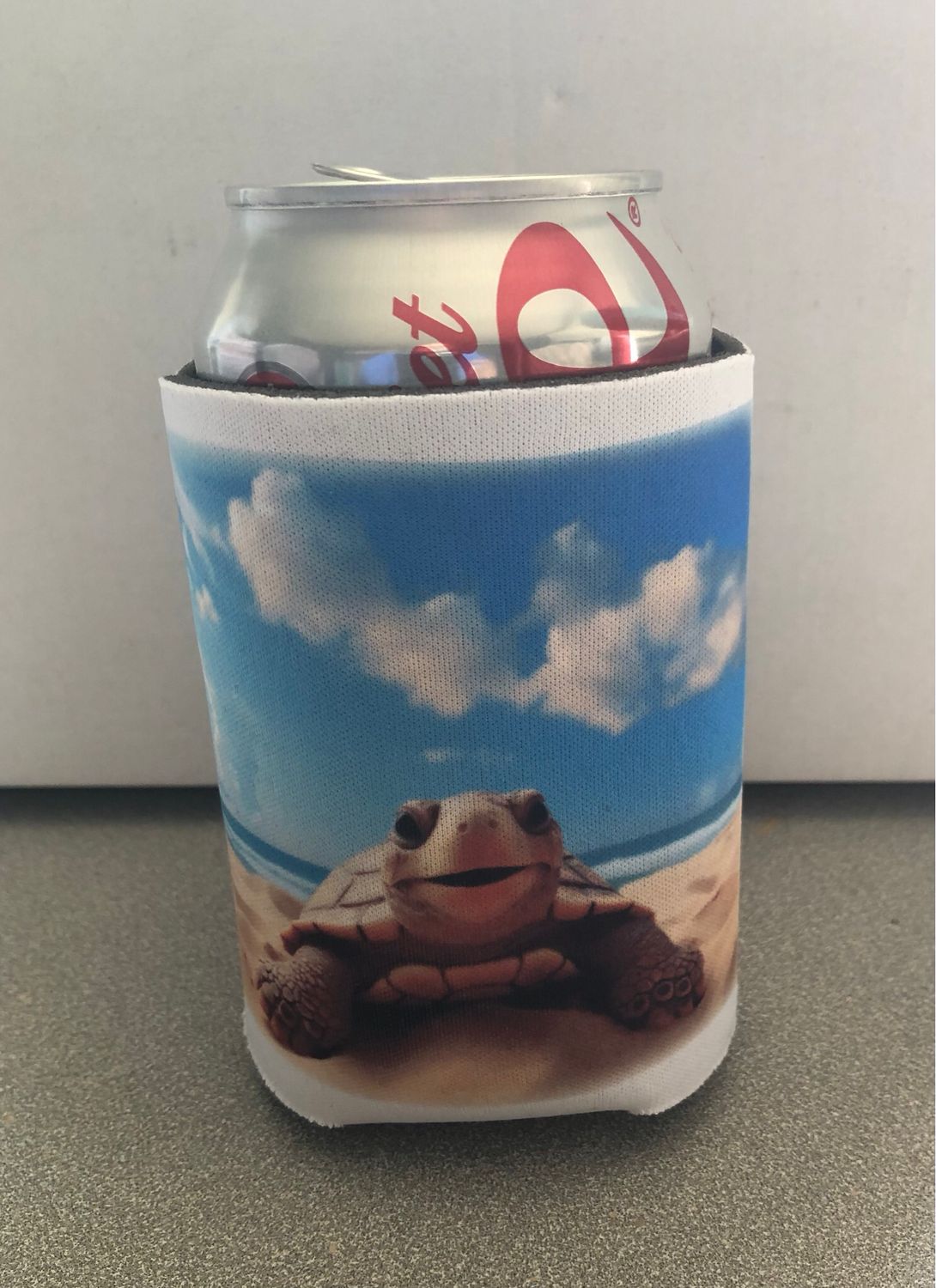 Sea turtle on the beach 12 oz Koozie