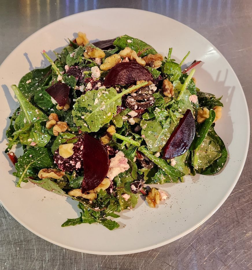 Salad plate with beets, spring mix and walnuts