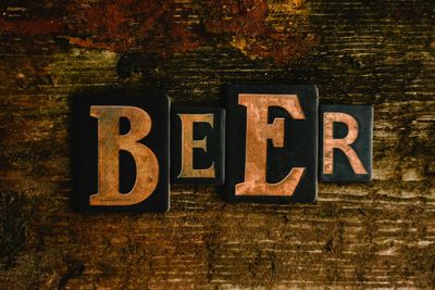 The letters BEER on a brick wall 