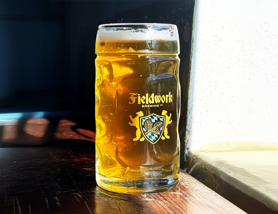 Glass of beer on a table top