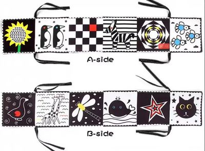 Newborn clothe book black and white | كتاب مواليد قماشي أبيض وأسود قابل للطي والتعليق يصدر صوت خرخشة 