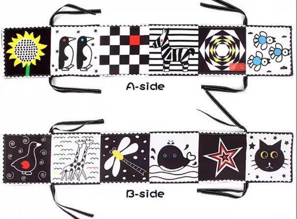 Newborn clothe book black and white | كتاب مواليد قماشي أبيض وأسود قابل للطي والتعليق يصدر صوت خرخشة 