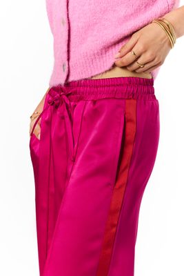 My Jewellery roze wijde broek in satijn look met rode tape
