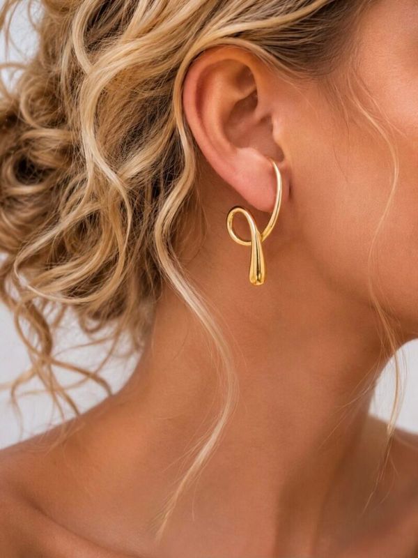 Ellen Beekmans Organic twist oorbellen Goud
