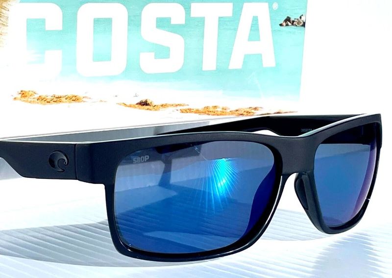 Costa Half Moon Blue Mirr 580P Shiny Blk/Mat Blk